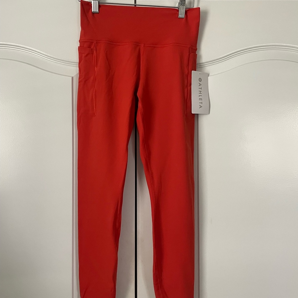 Athleta Orange Transcend Stash Tight - Leggings